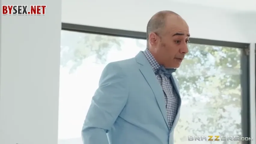 Sensual Encounter: Mature Blonde Submits to Muscular Man in Unique Setting