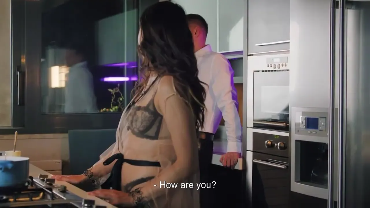 Young Brunette Delivers a Sensational Kitchen Blowjob