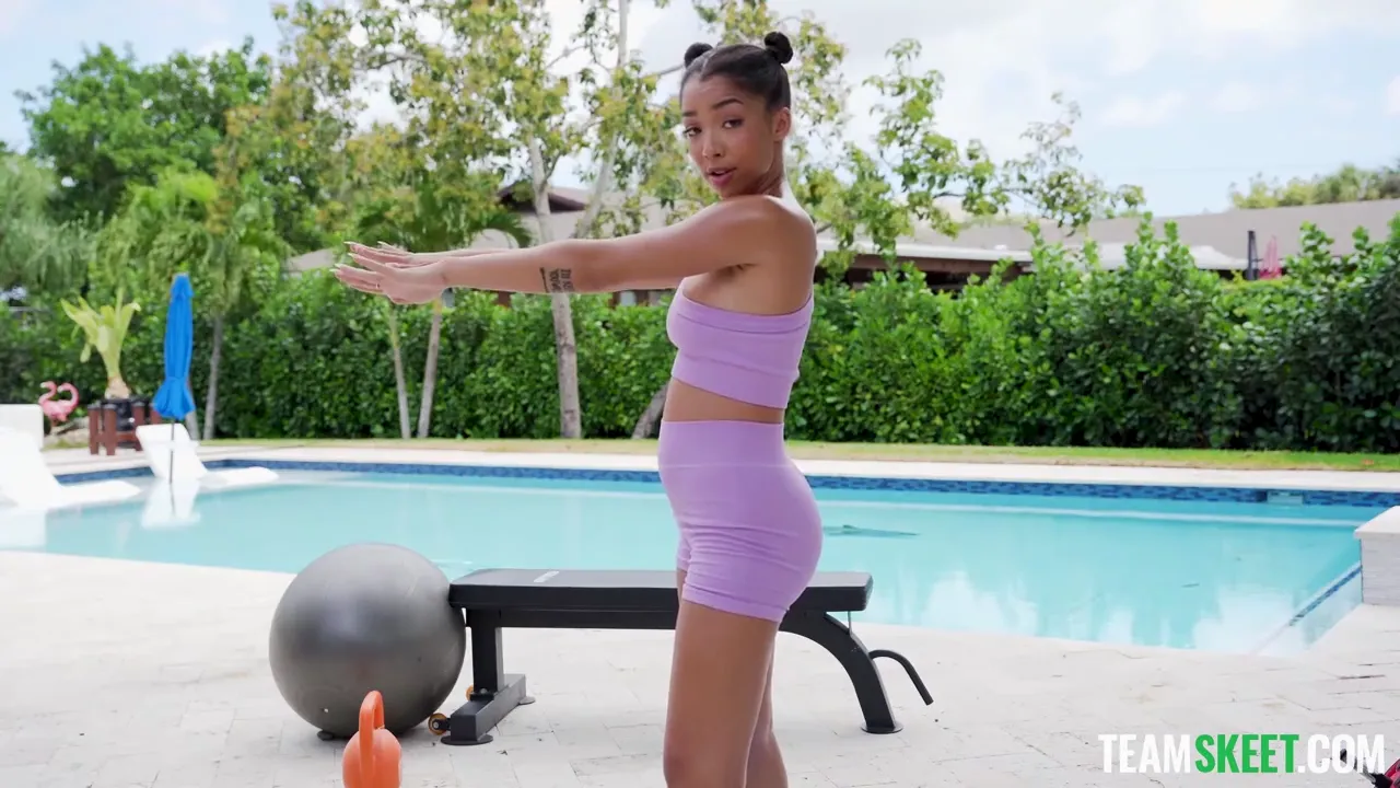 Exotic Fitness: A Mulatto Beauty Practices Sex Yoga with Her Trainer by the Pool