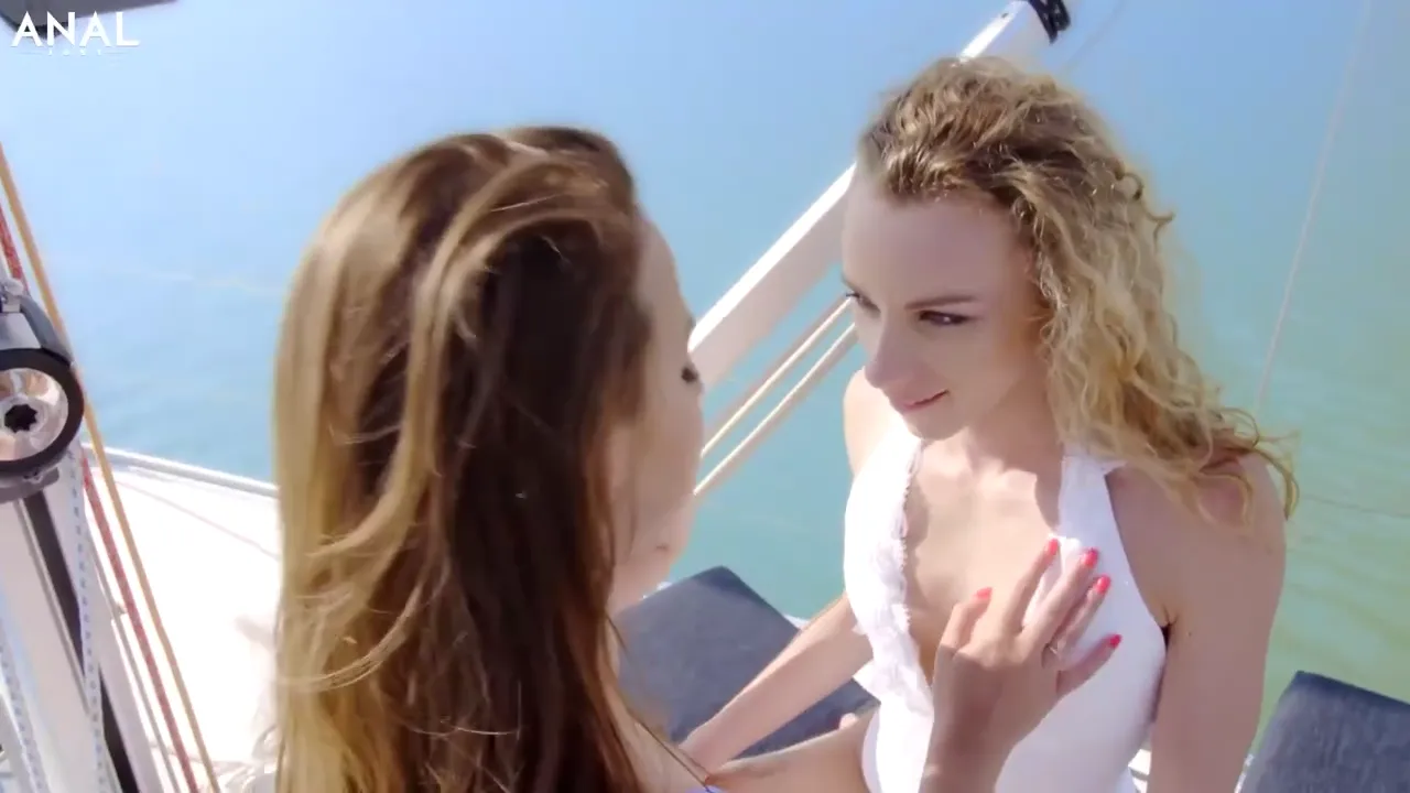 Two Lesbian Beauties Take Turns Pleasing a Lucky Guy