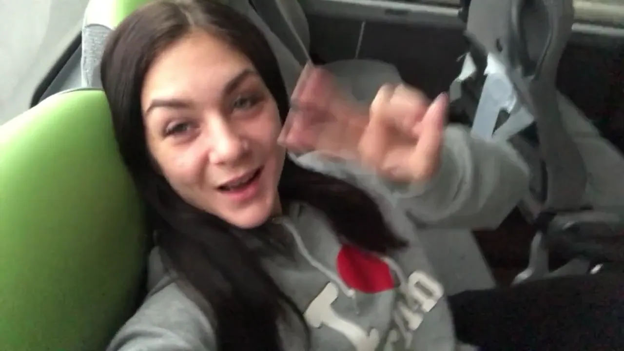 Young Brunette Gives a Hand Job to Her Boyfriend in a Car