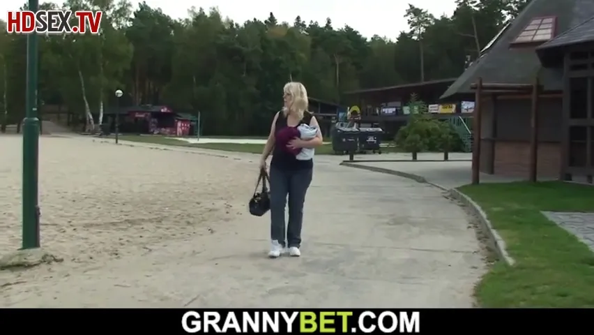 Mature Woman Enjoys Spontaneous Encounter with Young Man in Public