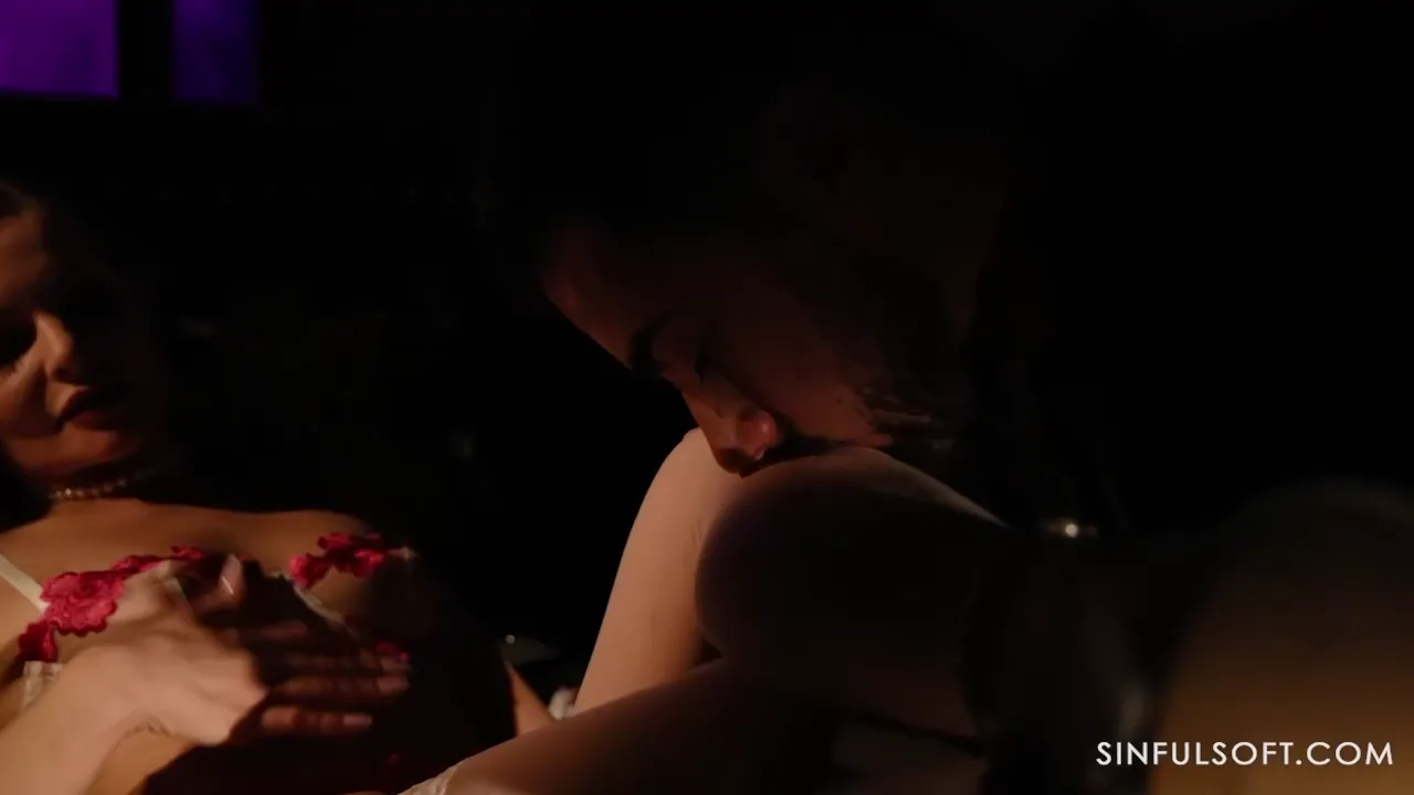 Passionate Beauty in Lingerie and Stockings Indulges in Sensual Delights