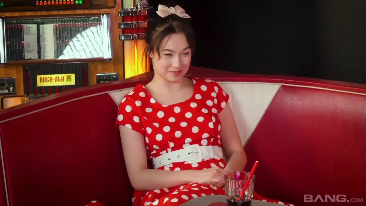Young Women Enjoy a Lesbian Group Encounter at a Café