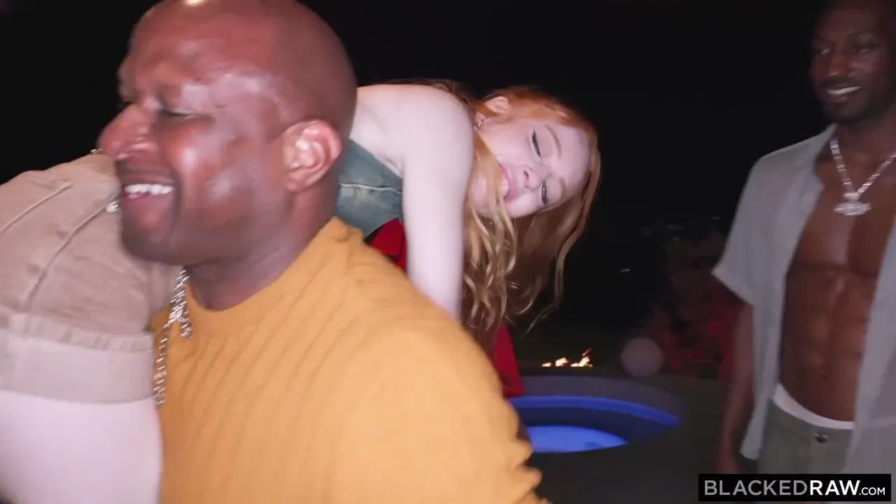 Fiery Redhead Joins Enthusiastic Crowd in a Wild Group Experience