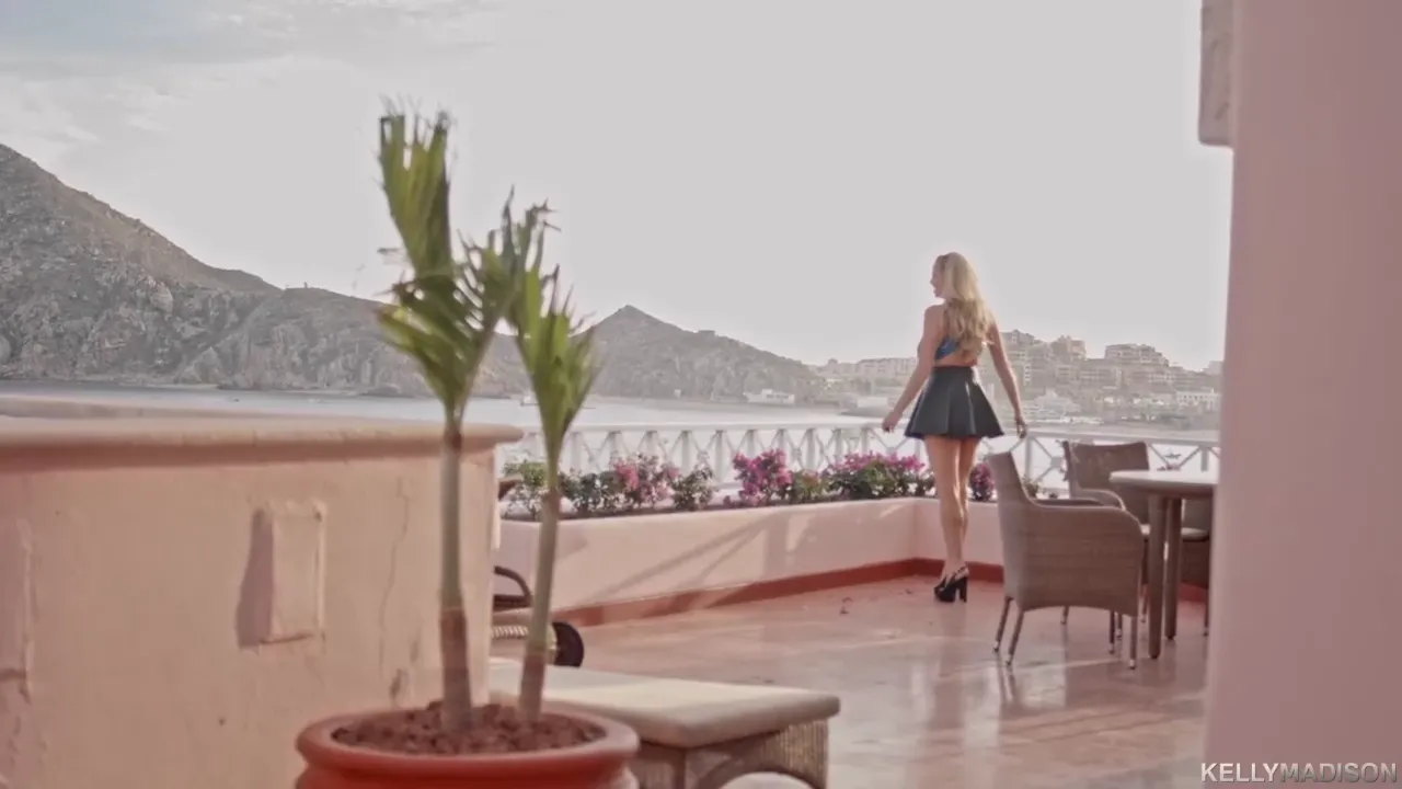 Seductive Blonde in a Short Skirt and Heels Ready to Tease