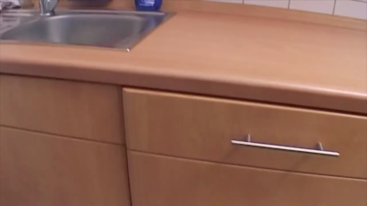 Sensational Solo Kitchen Session with a Busty MILF