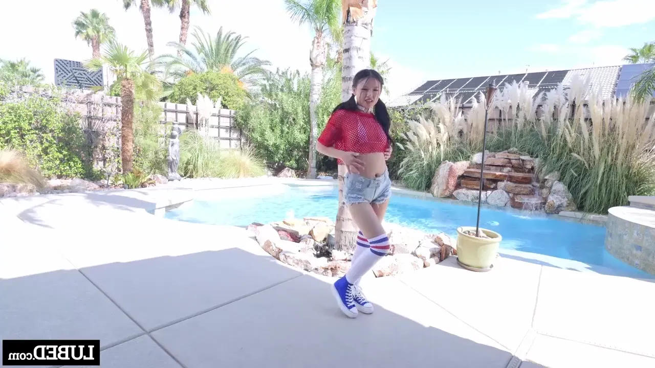 lulu chu petite asian pounded near the pool